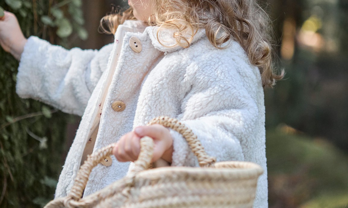 Fur coat with wooden buttons
