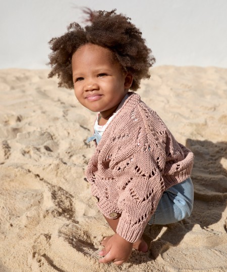 Veste en tricot avec boutons en coco